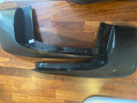 Genuine Astra G Coupe/Convertible rear rigid mud guards.